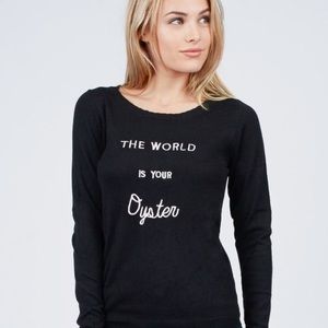 Yumi The World Is Your Oyster graphic text sweater